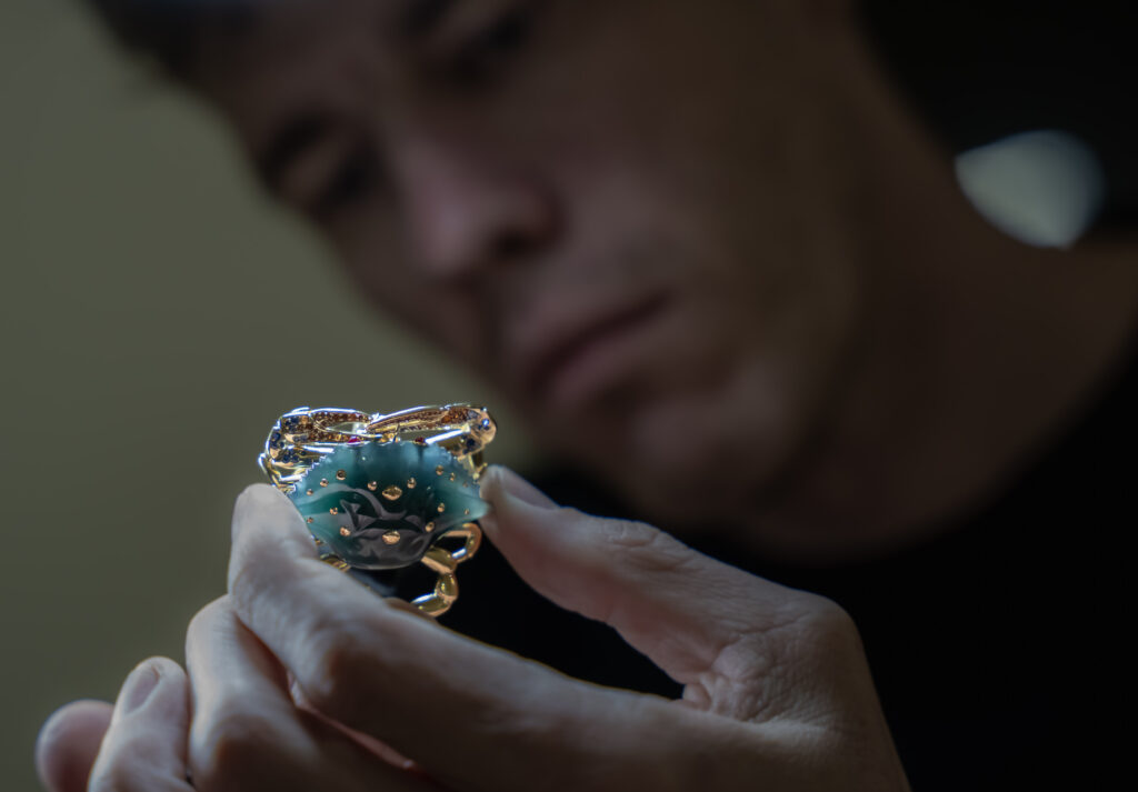 Blue Crab Pendant hand-carved from Guatemalan jadeite with blue sapphire and spessartite garnet claws